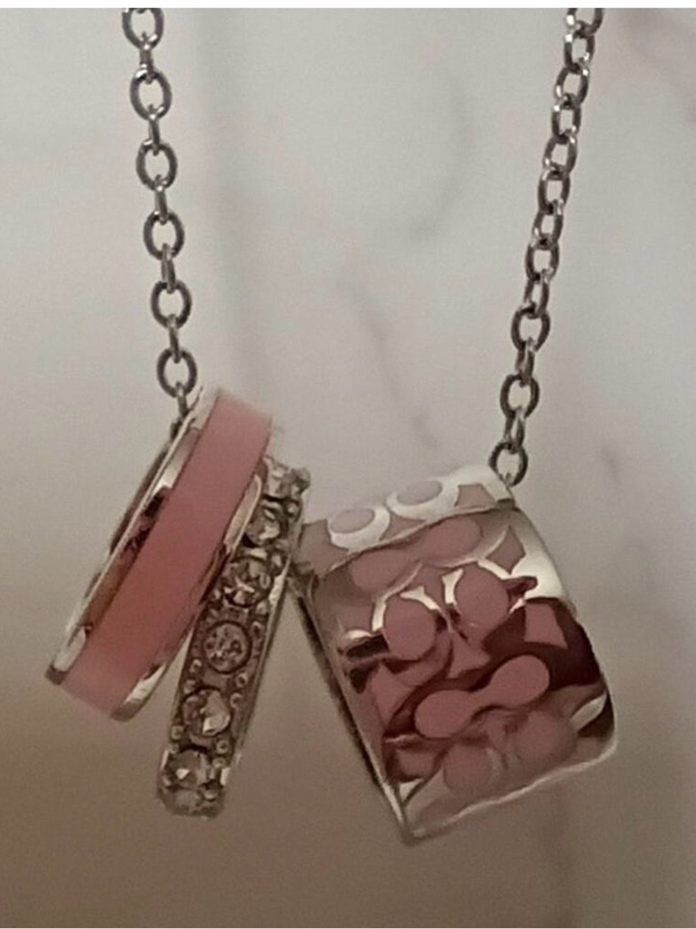 Coach Pink and Silver Ring Charm Necklace
NWT - Picture 2 of 4